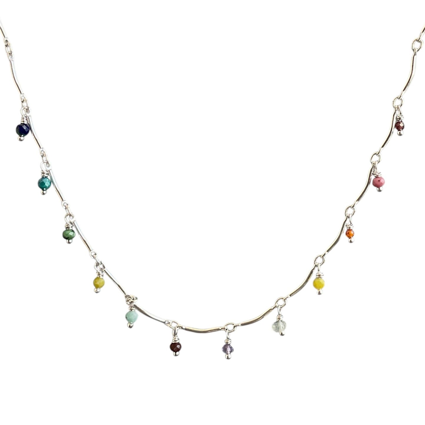 Sterling silver scalloped bar chain with rainbow gemstones at each intersection.