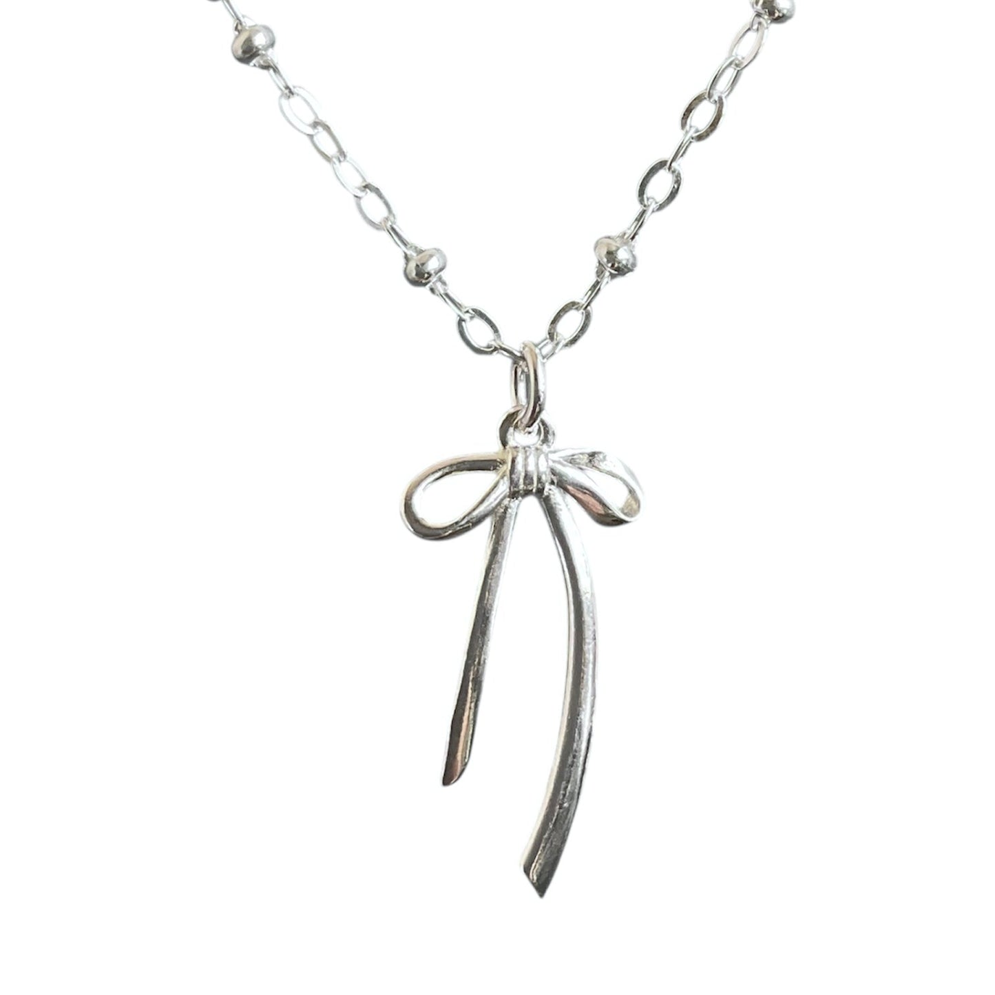 Sterling silver bow charm on a satellite chain.