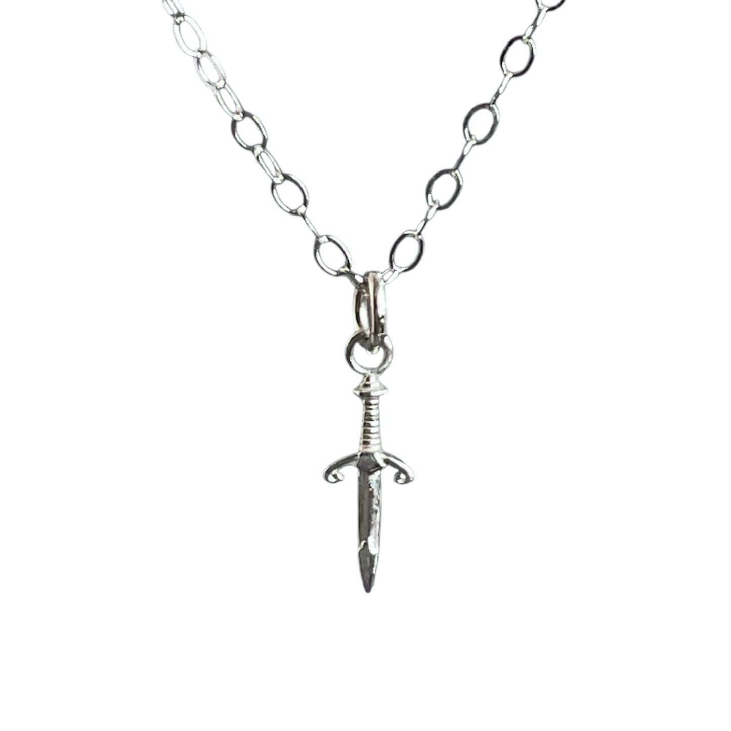 Silver sword pendant necklace on a white background