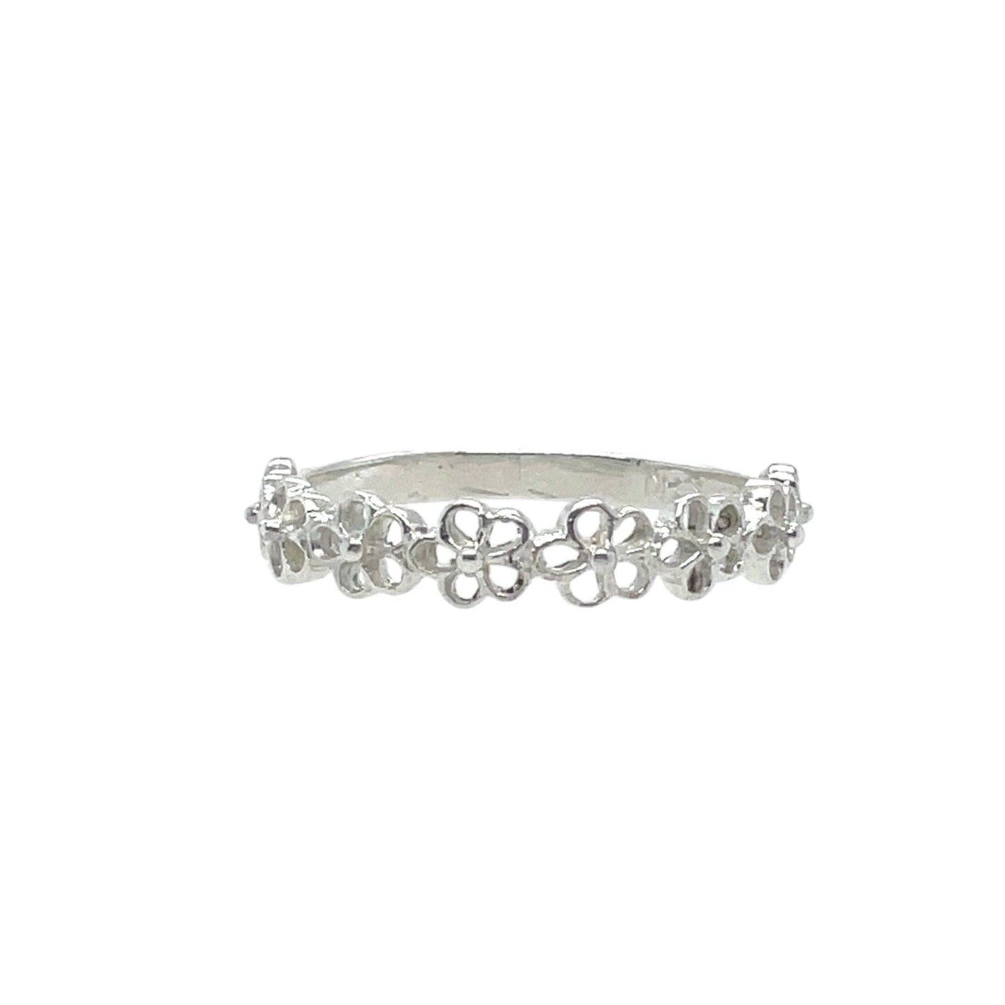 Dancing forget-me-not flowers on a half round ring band. Sterling silver.