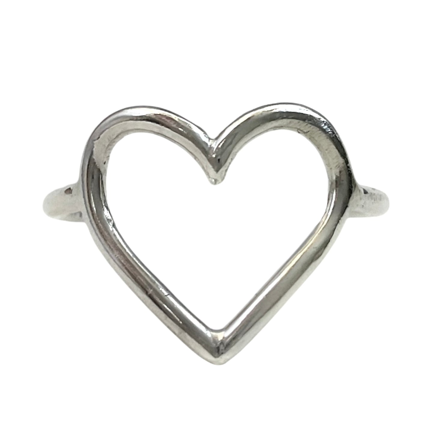 Silver heart-shaped ring on a white background