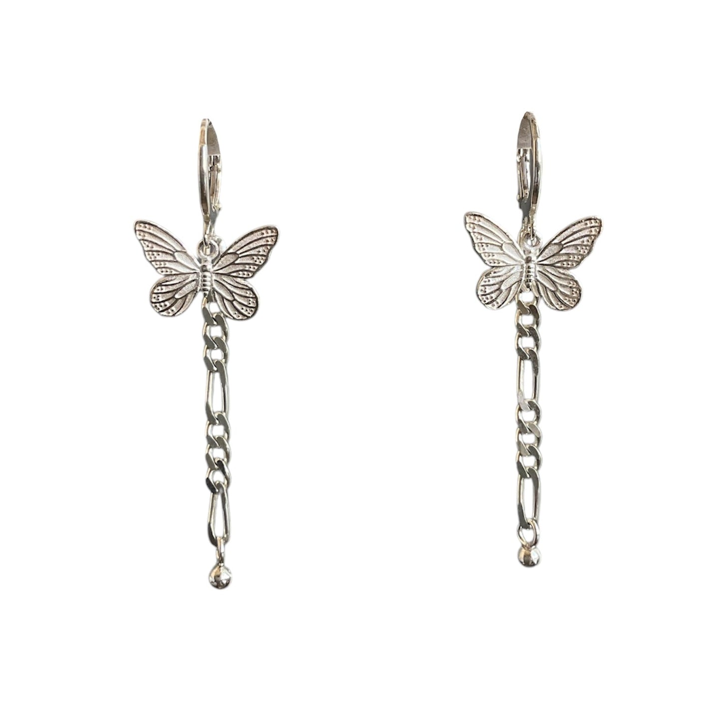 Sterling silver butterfly charms on a spring back hoop earring and a figaro chain dangle