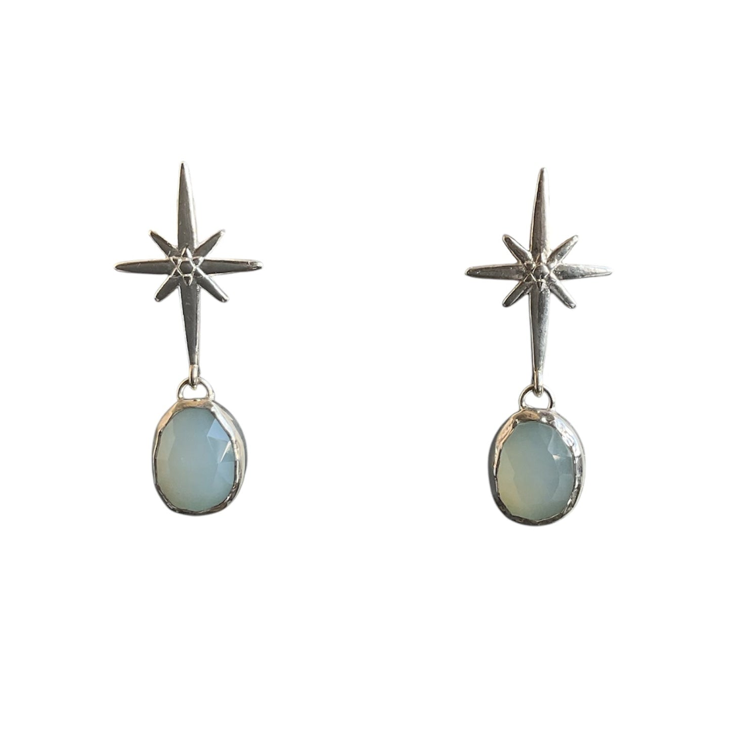 Romantic rose cut chalcedony stones shimmer under delicate silver north stars.
