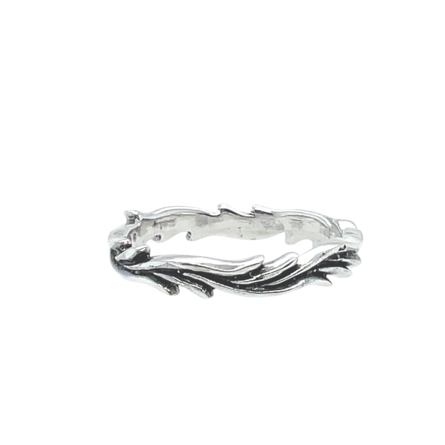 A whimsical laurel wreath pattern ring in shiny sterling silver with blackened recesses.