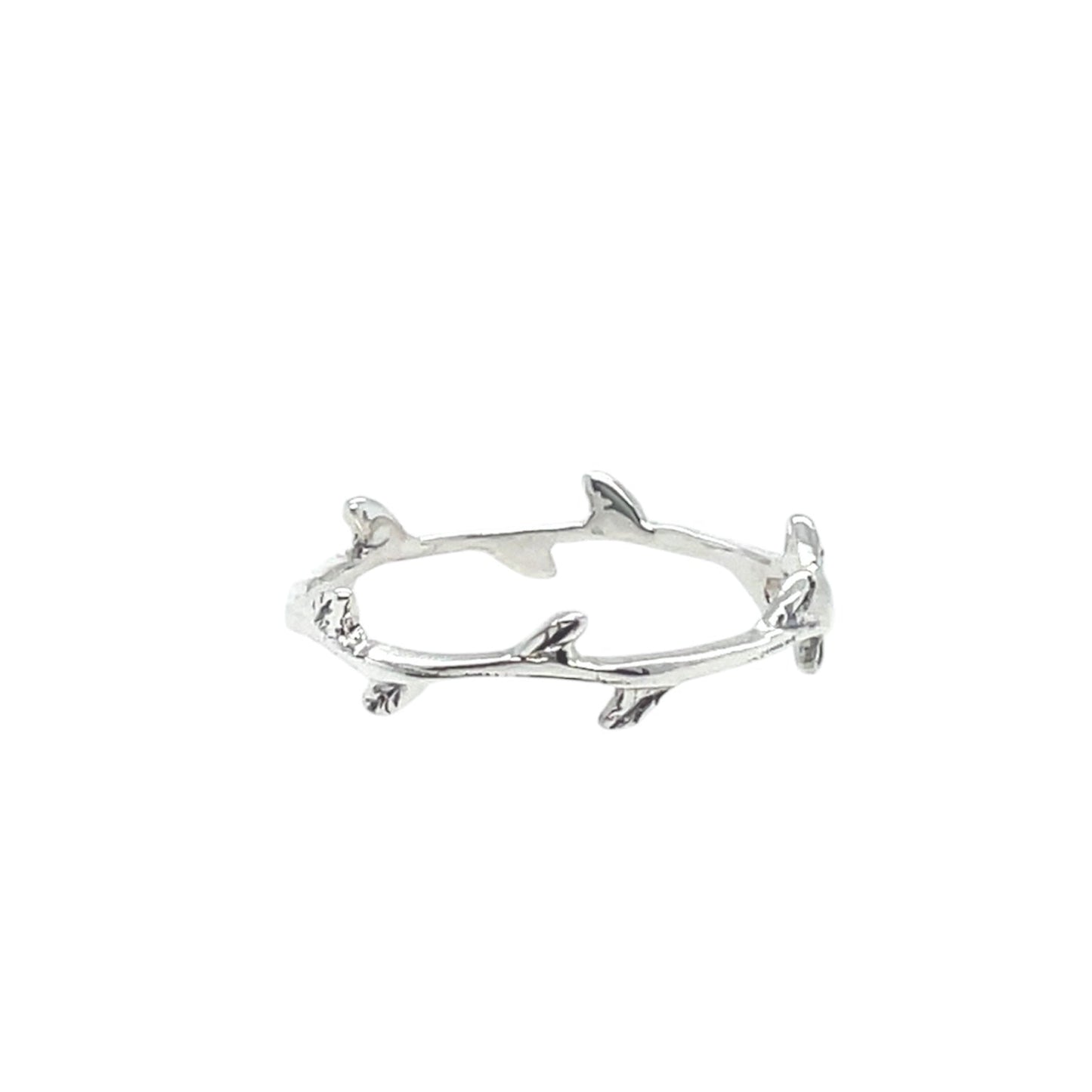 Thin and whimsical ring with tiny rose 'thorns.'