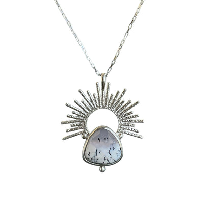 Snowy scenic dendritic opal gemstone set with a sterling silver sunrise halo
