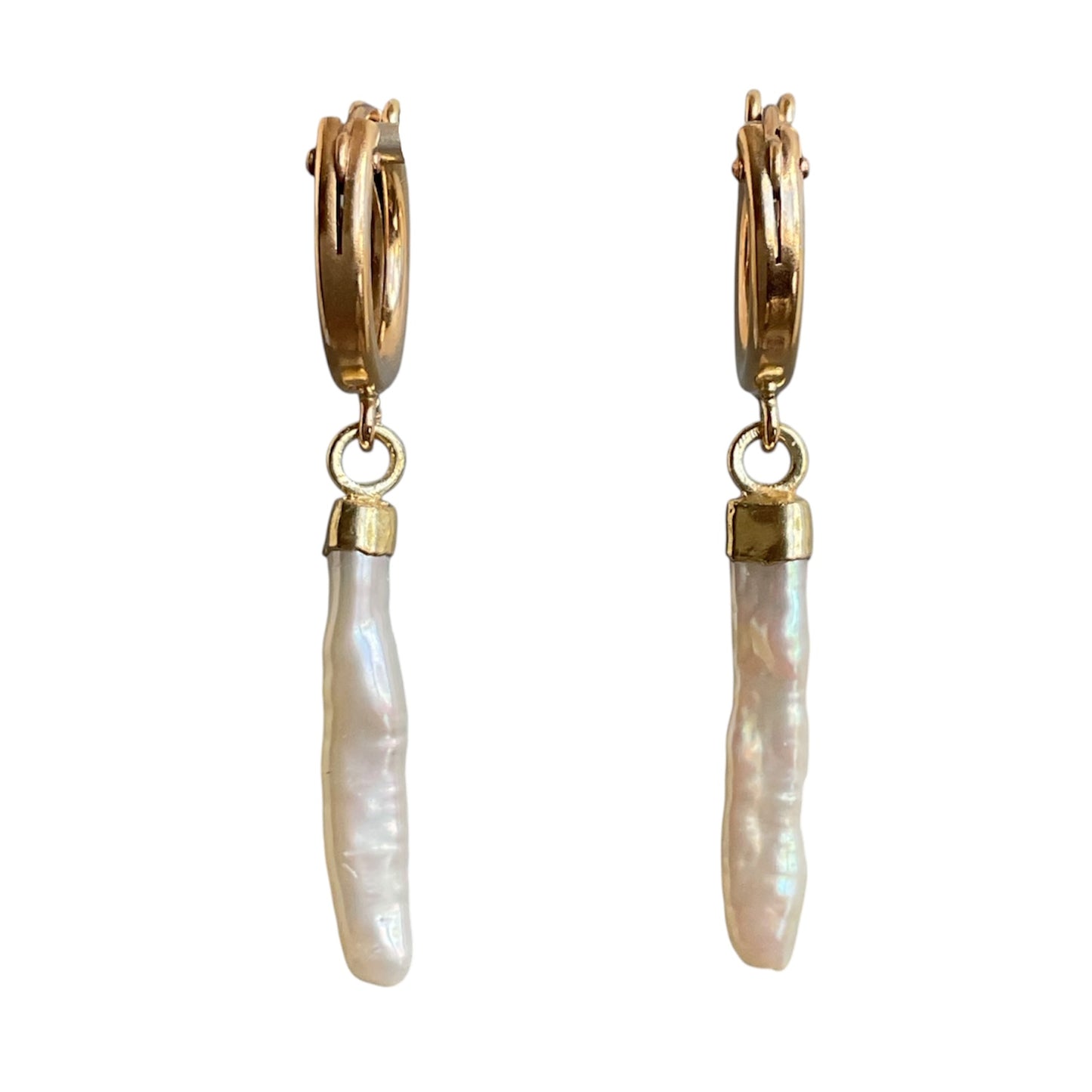 Gold hoop earrings with pearl drops on a white background