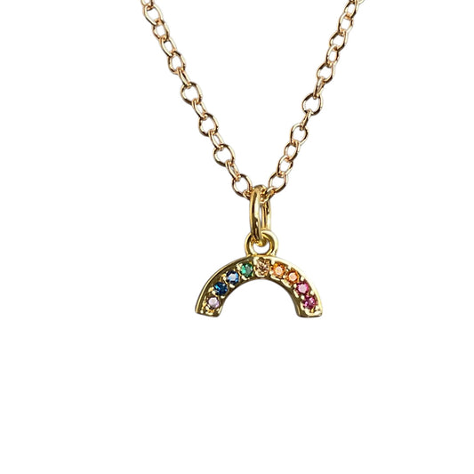 Gold necklace with a rainbow-shaped pendant on a white background