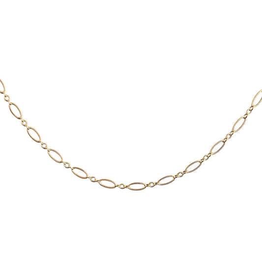 Gold chain necklace on a white background