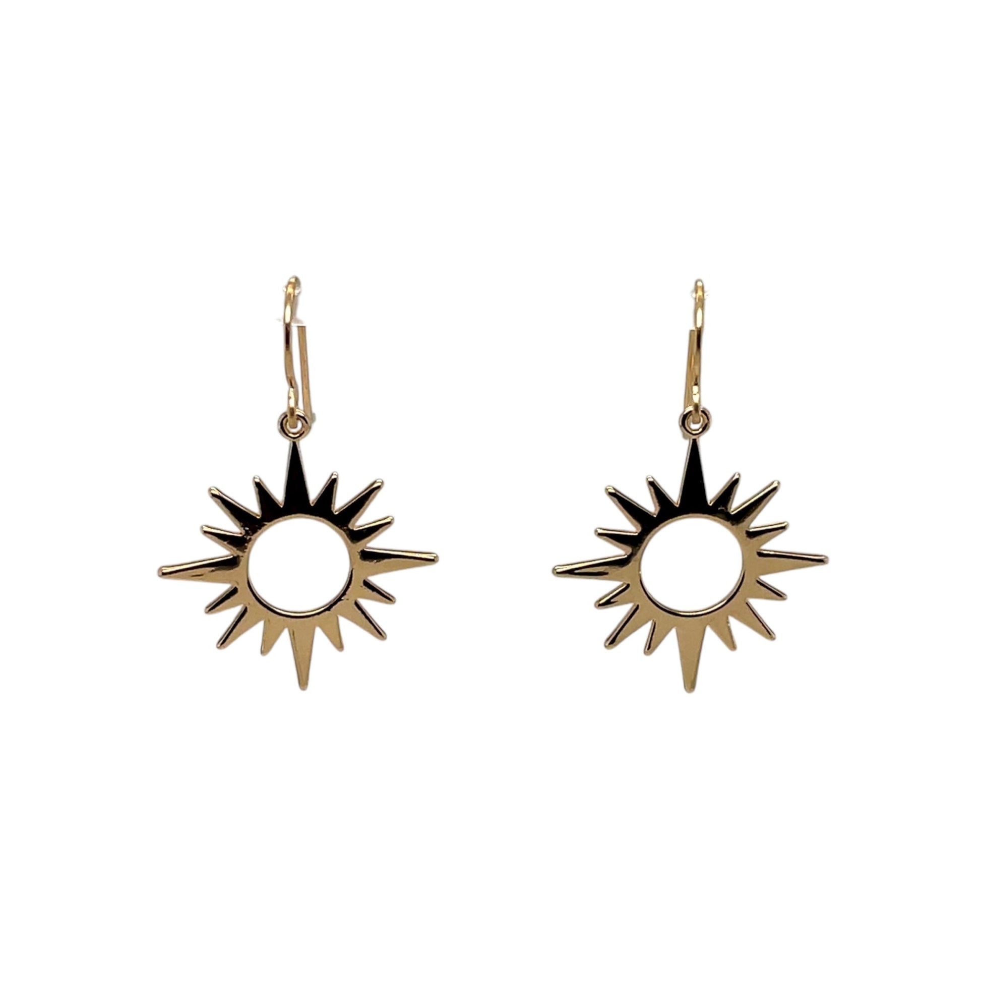 Gleaming open star sun drops on 14k gold-filled ear wires.