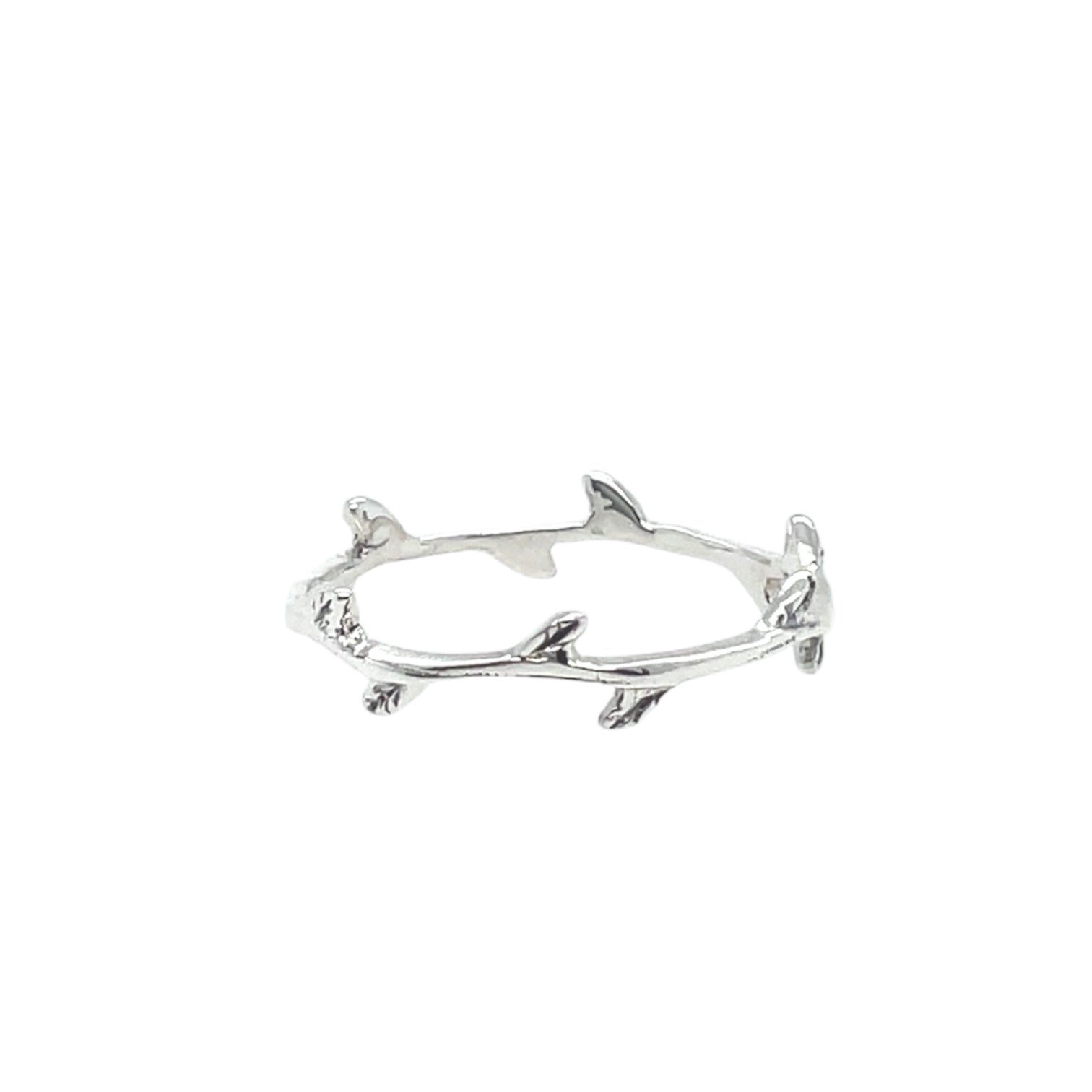 Thin and whimsical ring with tiny rose 'thorns.'