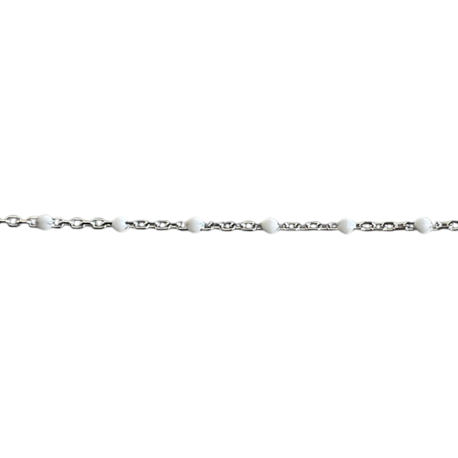 Silver chain with white enamel beads on a white background